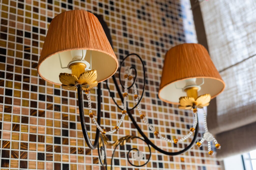 Terracotta Bathroom Ideas: A Fresh Look For Your Bathroom two lamp sconce with two fabric orange lampshades 2023 11 27 05 35 11 utc
