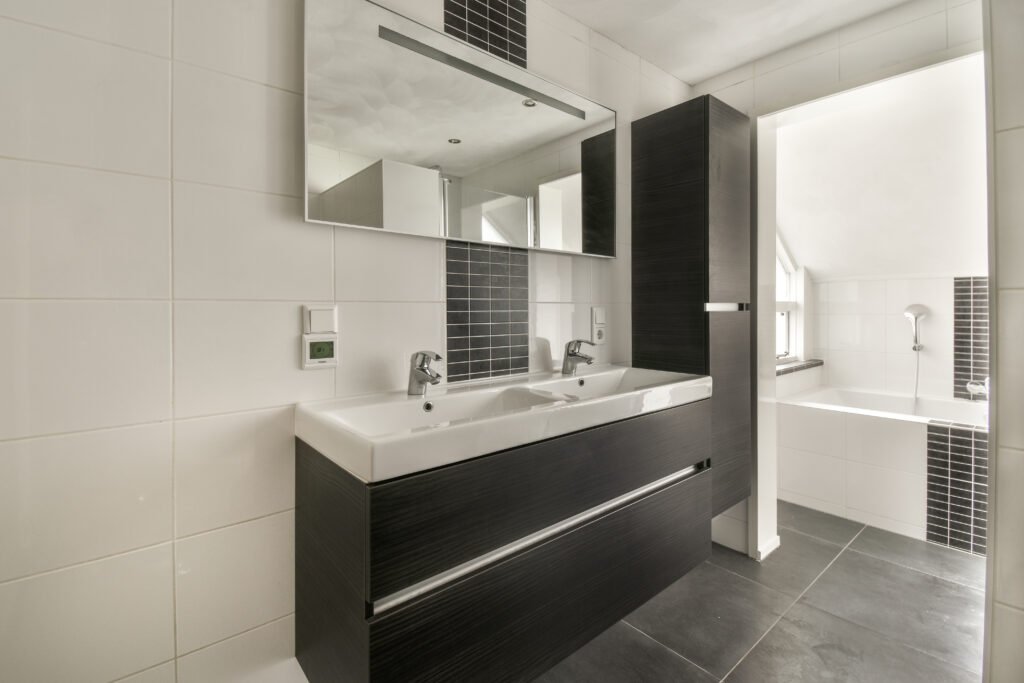 Black Bathroom Cabinet Ideas - A Guide to Bold and Stylish Storage interior of modern restroom with bathtub 2023 11 27 05 11 19 utc