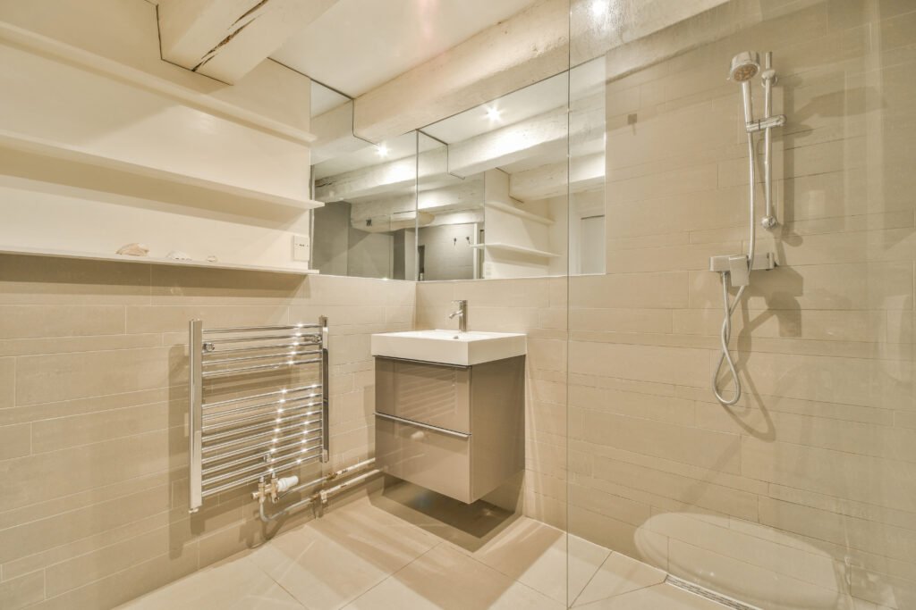 Beige Bathroom Tile Ideas - A Guide to Warm and Timeless Style toilet and shower in bathroom 2023 11 27 04 50 44 utc