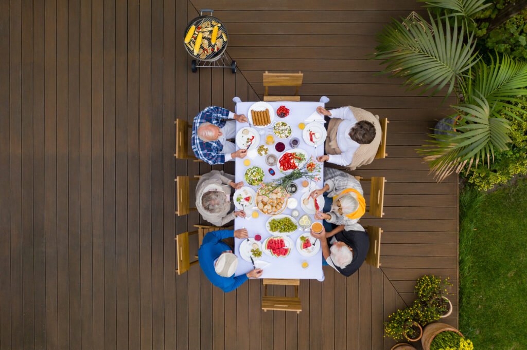 Transform Your Covered Patio - A Guide to Floor Ideas top view of terrace with table full of food and se 2024 10 20 11 50 24 utc